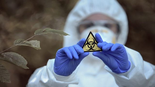 Biological,Hazard,Sign,In,Researcher,Hands,,Health,Threat,,Virus,Danger, Biological hazard sign in researcher hands, health threat, virus danger, toxin